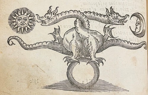 Two dragons perched atop a ring with their necks intertwined