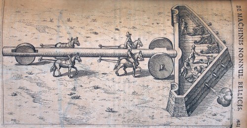 a long pole on wheels flanked by horses, attached to a wedge shaped battery, with room for people firing cannons