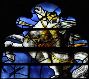 A white rearing horse with an arrow or lance sticking out of it